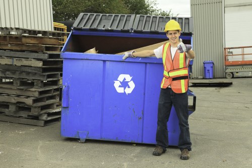 Workers loading rubbish in Lewisham for removal